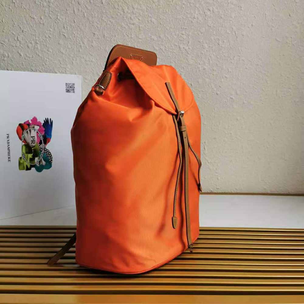 Side angle showing adjustable straps on Prada Nylon and Saffiano Backpack