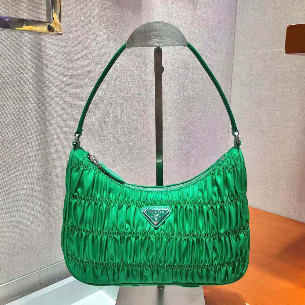 Close-up of silver-tone hardware on Prada Women Nylon and Saffiano Leather Mini Bag-Green