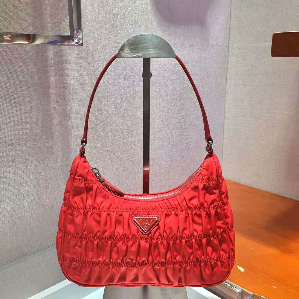 Close-up of silver hardware on Prada Women Nylon and Saffiano Leather Mini Bag-Red