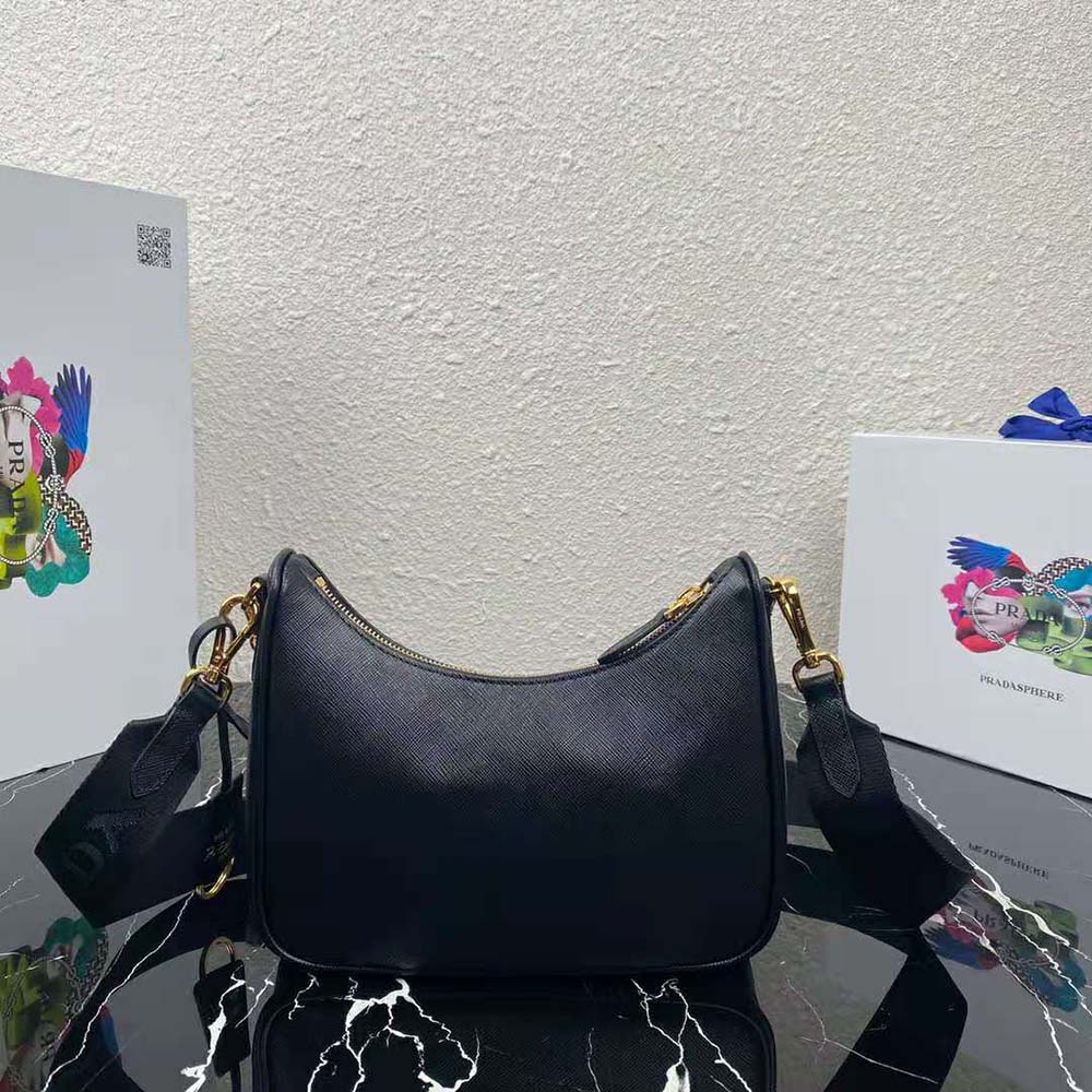 Side angle showing adjustable strap and silver hardware on Prada bag