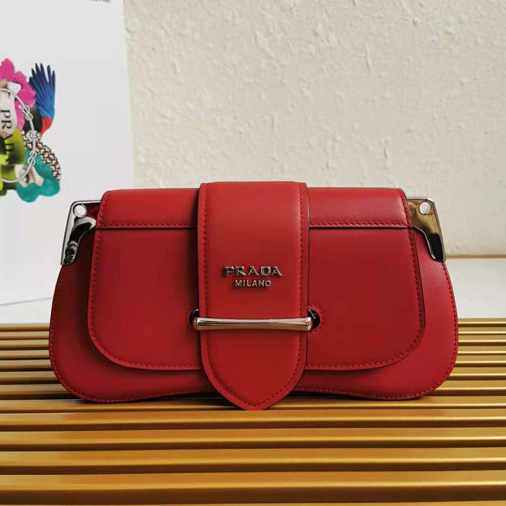 Side profile showing silhouette of Prada Women Prada Sidonie Shoulder Bag-Red