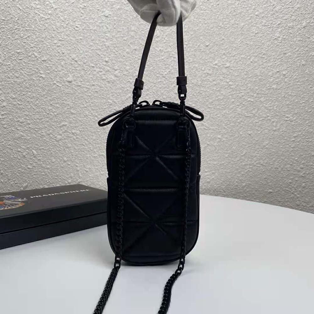 Side angle showing slim silhouette of Prada Women Prada Spectrum Mini-Bag-Black