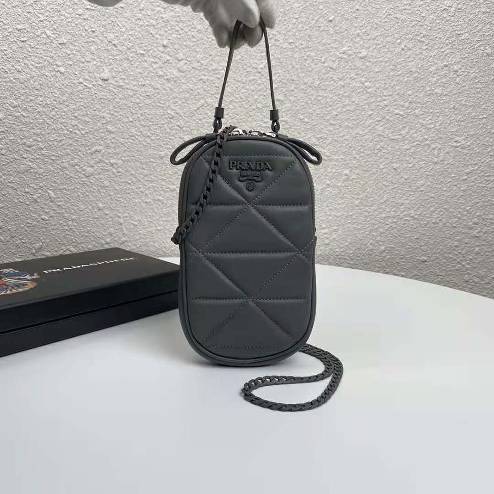 Close-up of silver triangular hardware on Prada Women Prada Spectrum Mini-Bag-Grey