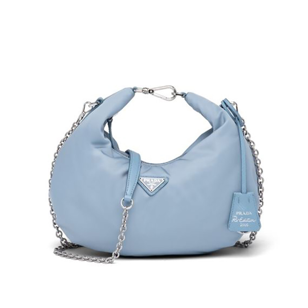 Front view of Prada Women Re-Edition 2006 Nylon Bag-Blue with zip closure