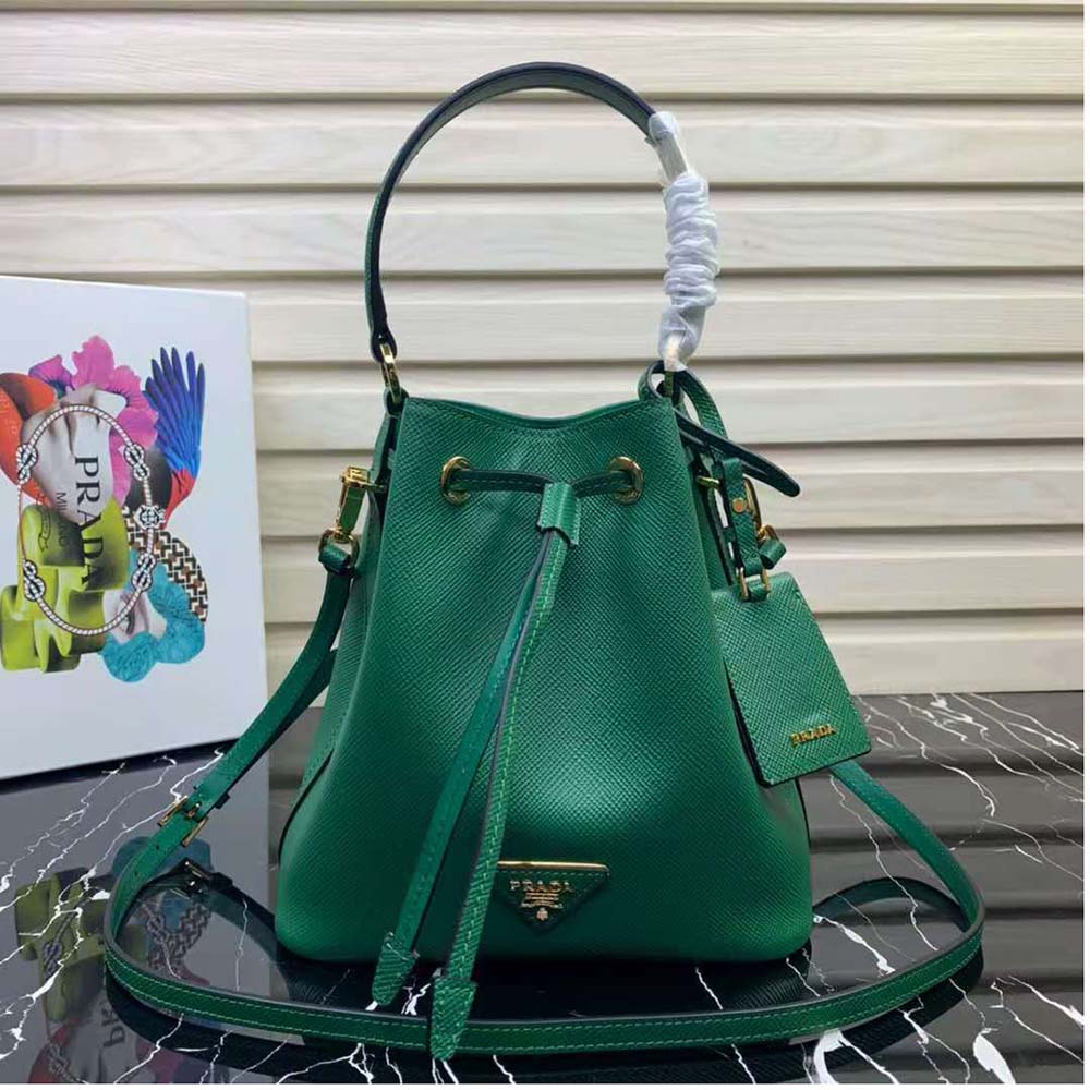 Close-up of gold-tone hardware and drawstring closure on Prada Women Saffiano Leather Bucket Bag-Green