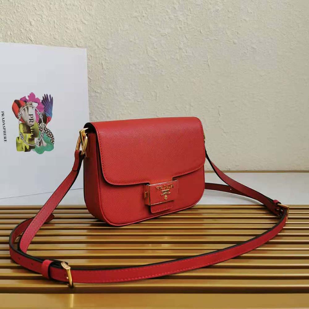 Side angle showing compact silhouette and adjustable strap on Prada Embleme Bag