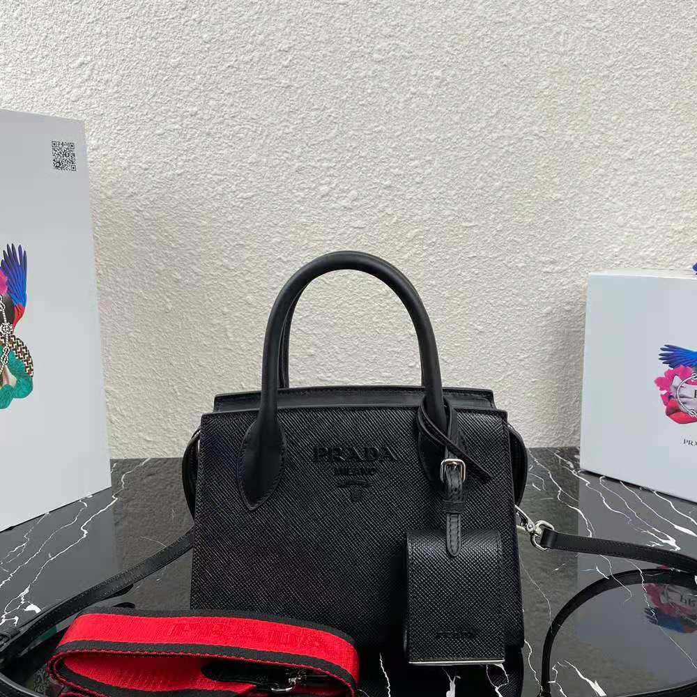 Close-up of silver-tone logo hardware on Prada Monochrome Bag-Black