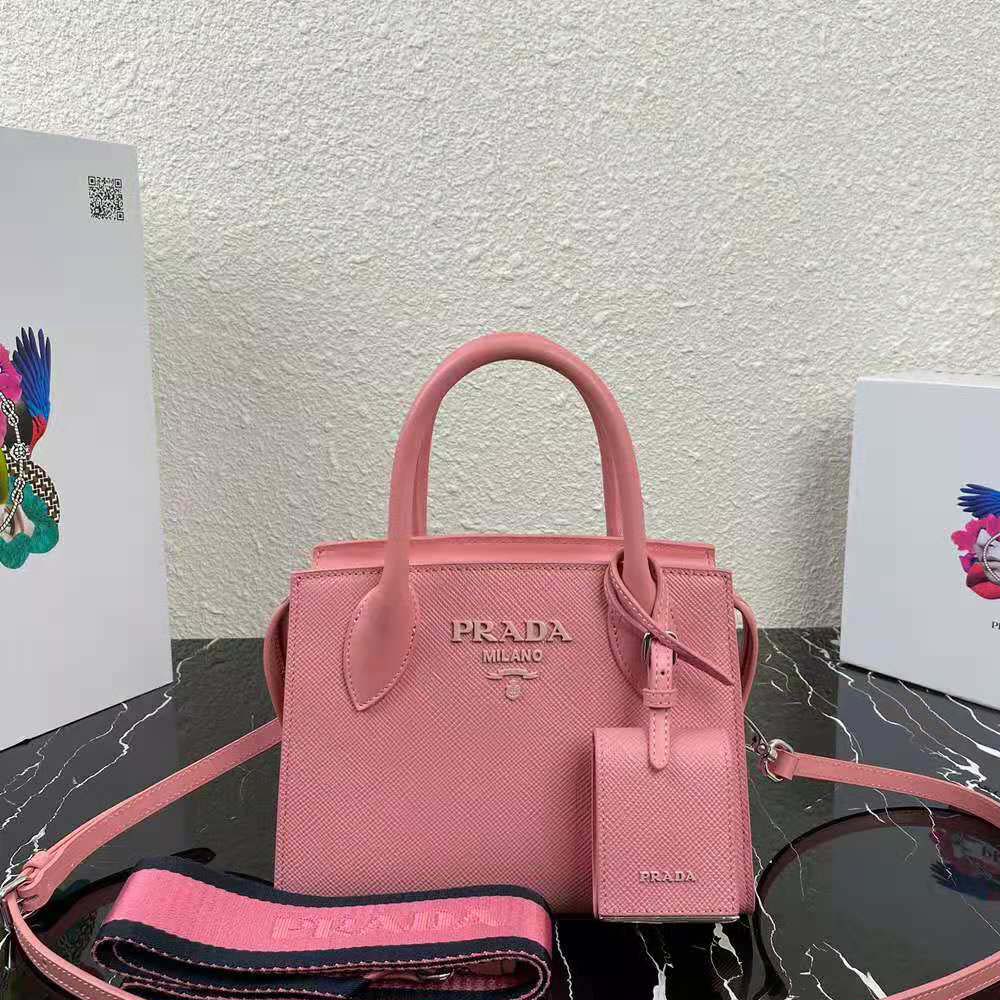 Close-up of pink saffiano leather texture and Prada logo detail