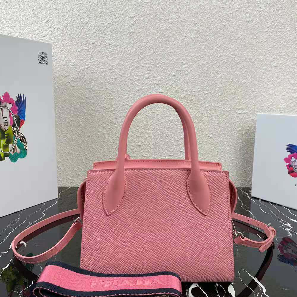Side angle showing zip closure and silver hardware on Prada Monochrome Bag