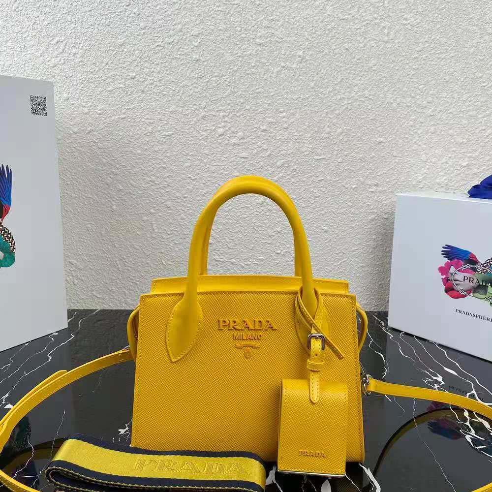 Close-up of gold-tone hardware on Prada Women Saffiano Leather Prada Monochrome Bag-Yellow