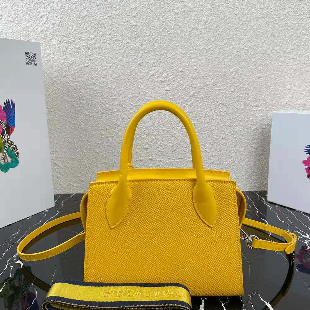 Side angle showing saffiano leather texture on Prada Women Saffiano Leather Prada Monochrome Bag-Yellow