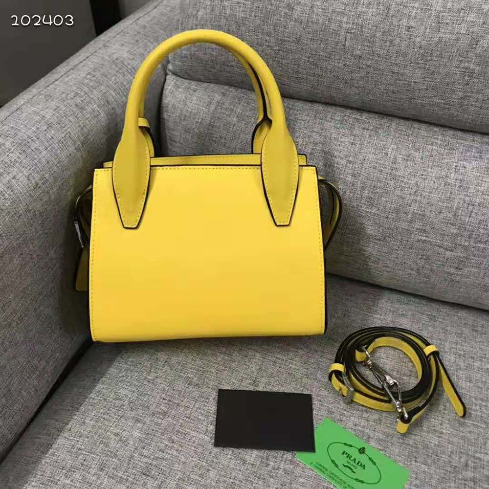 Close-up of Prada Kristen Handbag yellow saffiano leather texture detail