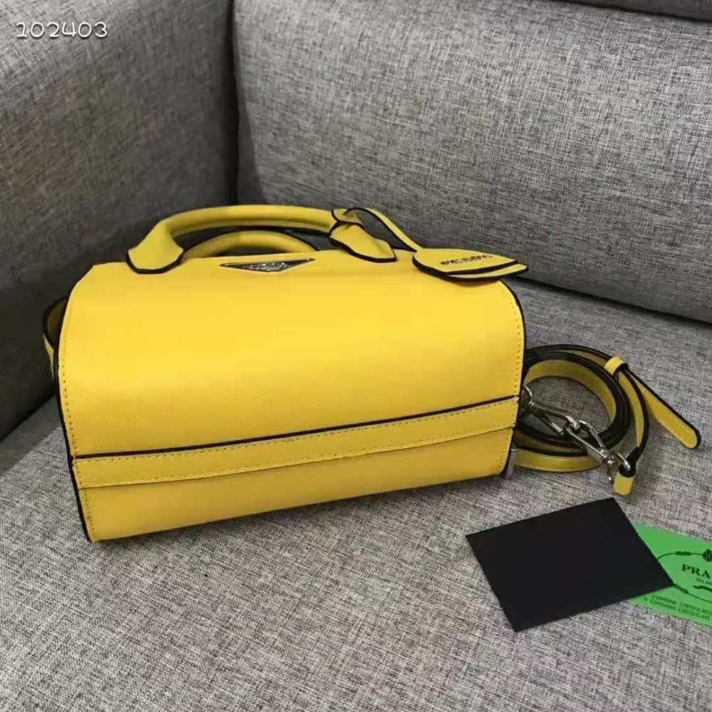 Side angle showing silver hardware on Prada Women Saffiano leather Prada Kristen Handbag-Yellow