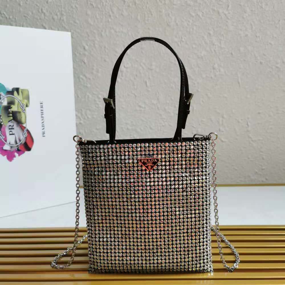 Close-up of silver-tone decorative hardware on Prada Women Satin Handbag with Decoration-Silver