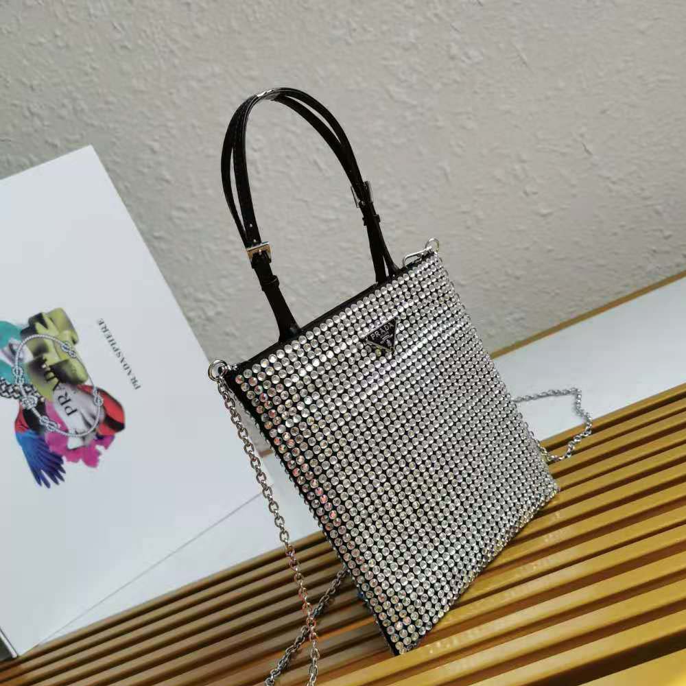 Side profile highlighting compact silhouette of Prada Women Satin Handbag with Decoration-Silver