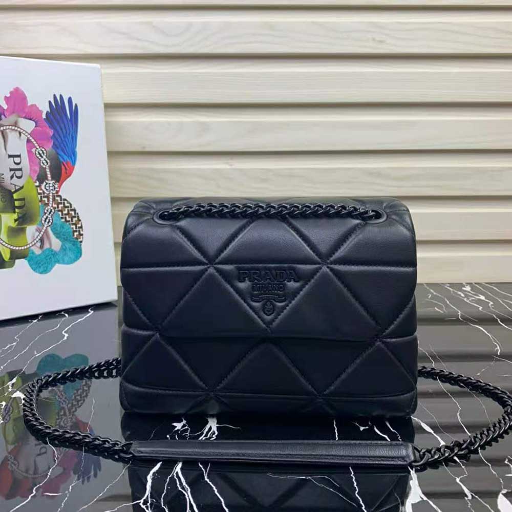 Close-up of silver-tone hardware on Prada Spectrum Bag in black leather
