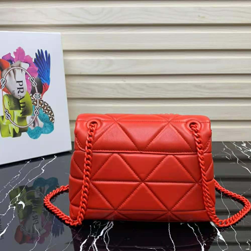 Side profile showing smooth nappa leather texture on Prada Spectrum bag
