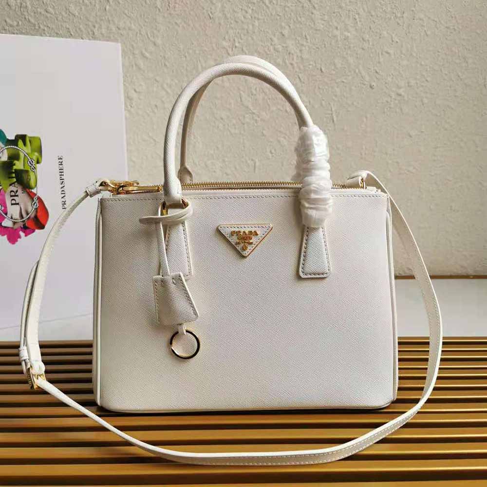 Close-up of gold-tone hardware on Prada Women Small Saffiano Leather Prada Galleria Bag-White