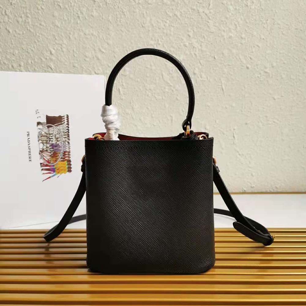 Side angle showcasing silhouette of Prada Women Small Saffiano Leather Prada Panier Bag-Black