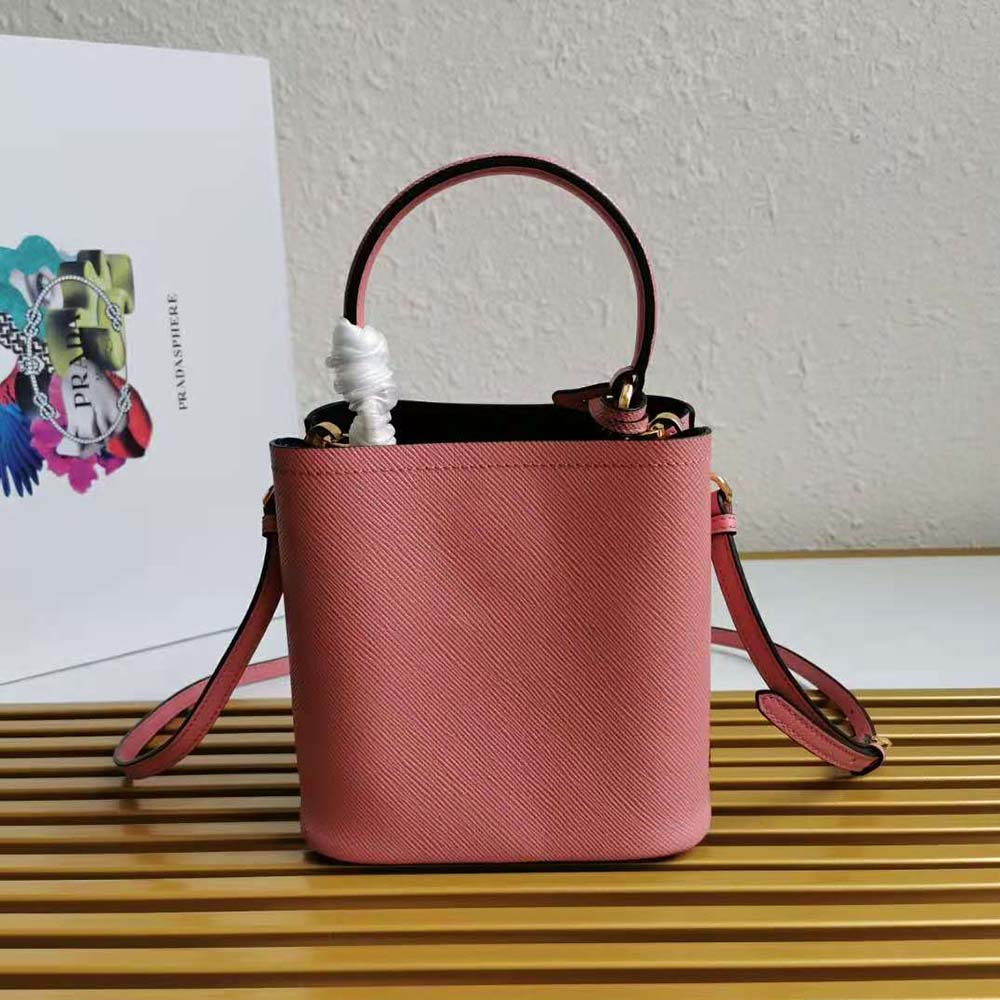 Side angle showing structured silhouette of Prada Women Small Saffiano Leather Prada Panier Bag-Pink
