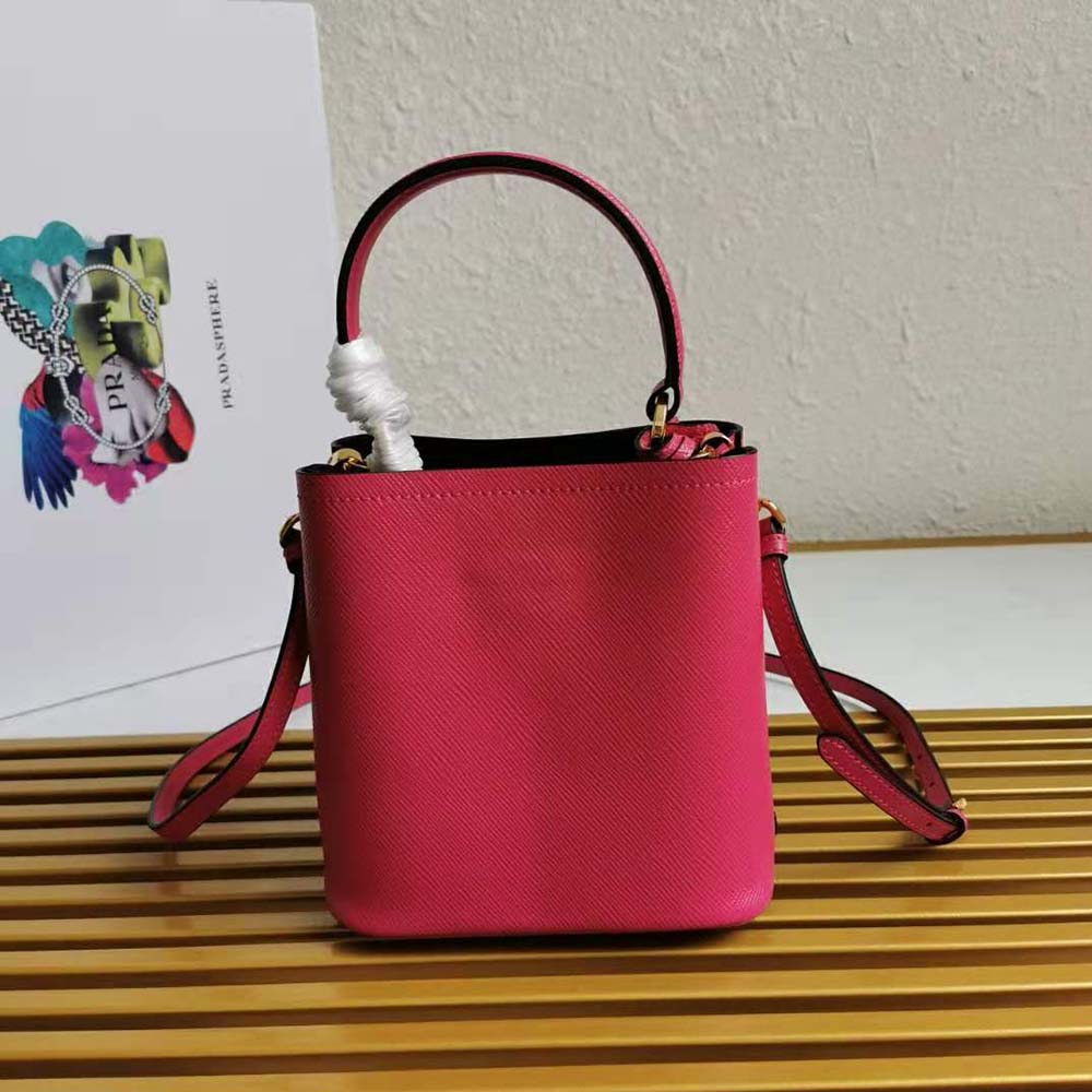 Side profile highlighting rose colour of Prada Women Small Saffiano Leather Prada Panier Bag-Rose