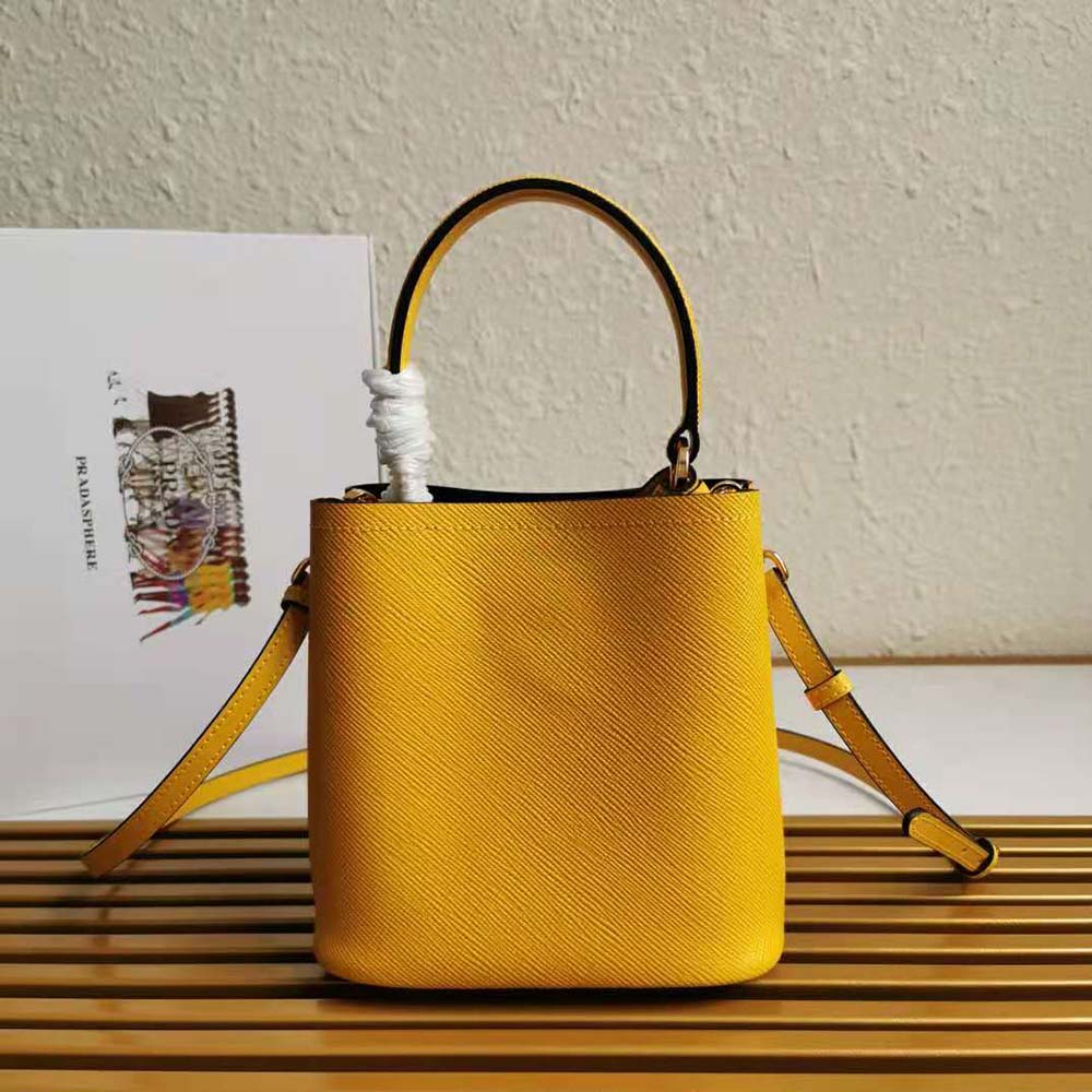 Side angle showing adjustable strap on Prada Women Small Saffiano Leather Prada Panier Bag-Yellow