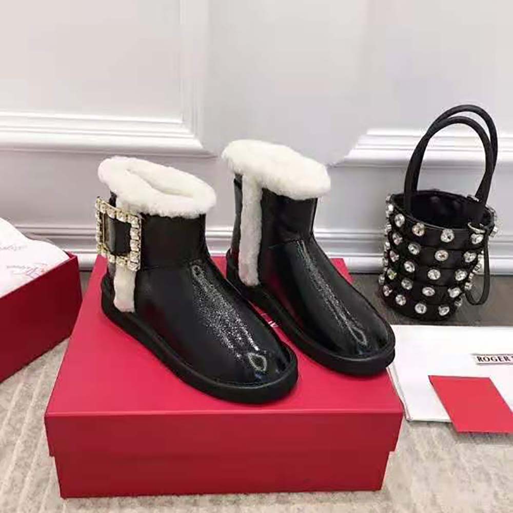 Close-up of sparkling strass buckle on Roger Vivier Winter Viv’ booties