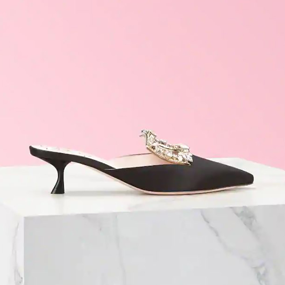Side profile of Roger Vivier Women Broche Vivier Buckle Mules in Satin Black