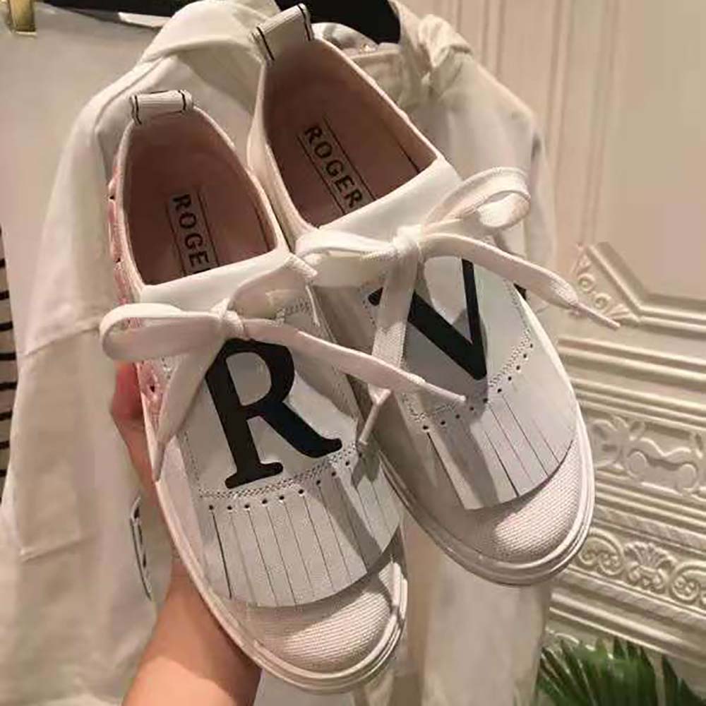 Close-up of white leather and lace-up closure on Roger Vivier Women Call Me Vivier Patch Sneakers-White