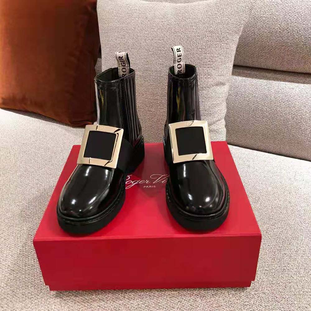 Top angle showing black leather and sleek silhouette of Roger Vivier ankle boots