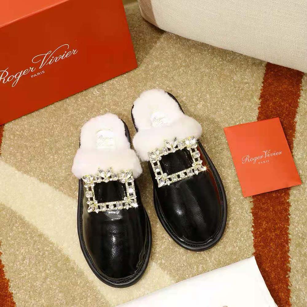 Close-up of oversized silver buckle on Roger Vivier Broche Vivier Buckle Mules