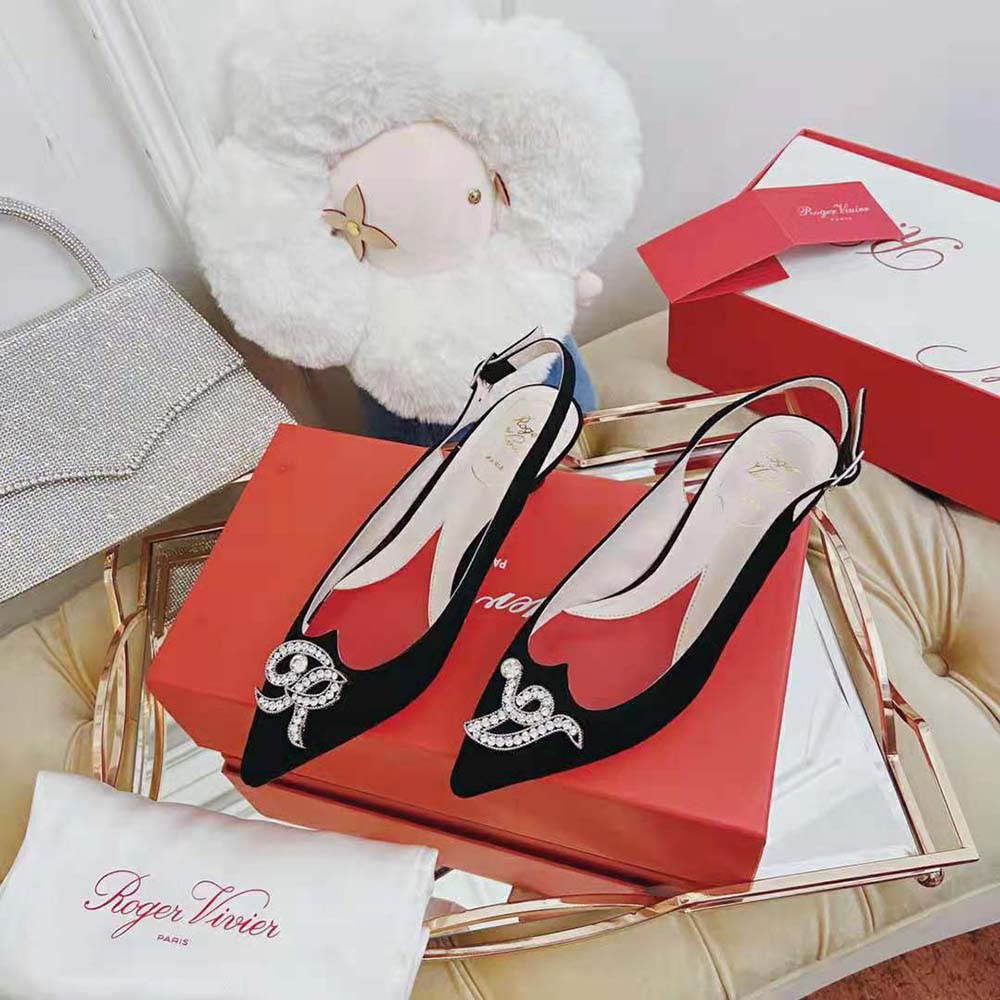 Close-up of jewel buckle on Roger Vivier Women I Love Vivier RV Jewel Slingback Pumps