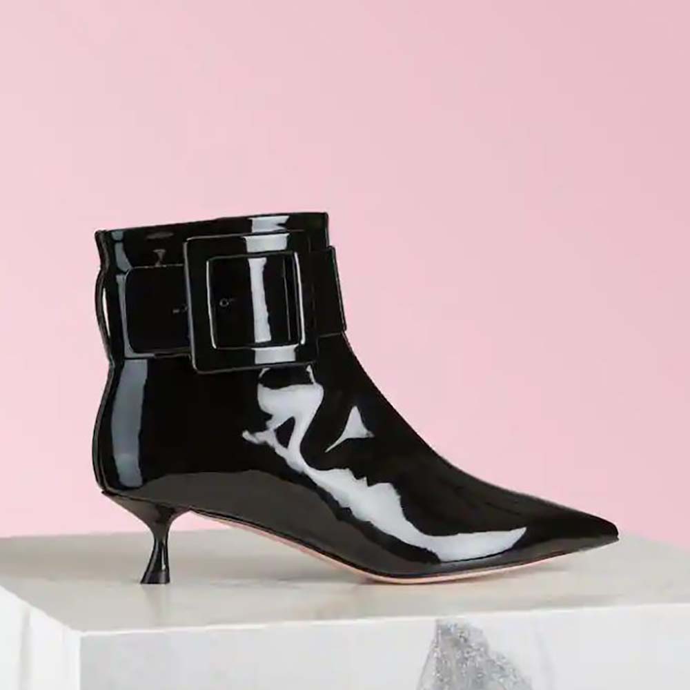 Side view of Roger Vivier Women Pointy Covered Buckle Ankle Boots in black patent leather