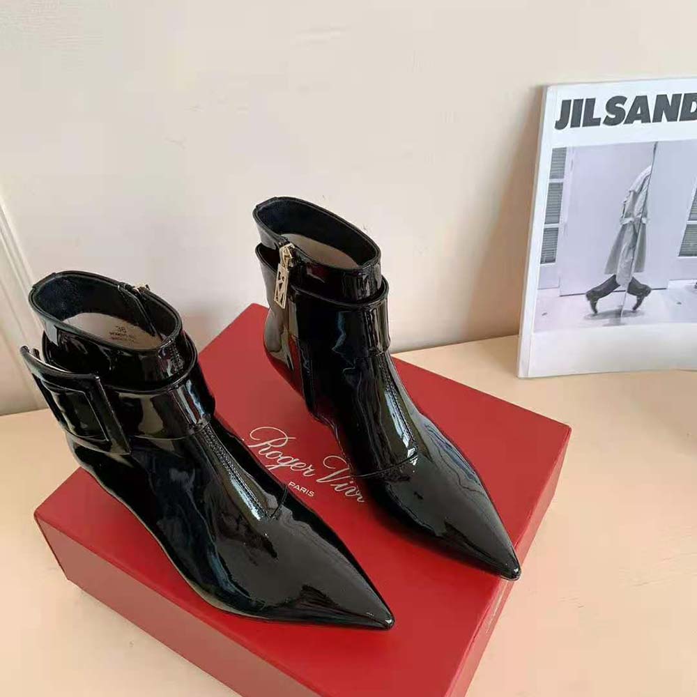 Top-down look at pointed toe and sleek silhouette of Roger Vivier boots
