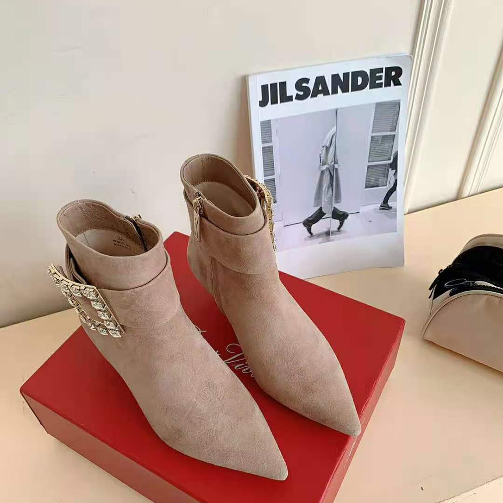 Top view showing pointed toe and suede texture of Roger Vivier boots