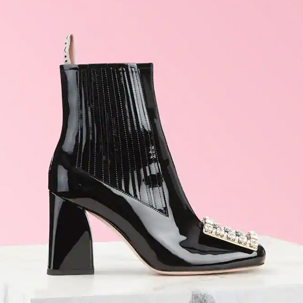 Side view of Roger Vivier Women Tres Vivier Strass Buckle Chelsea Booties black patent leather