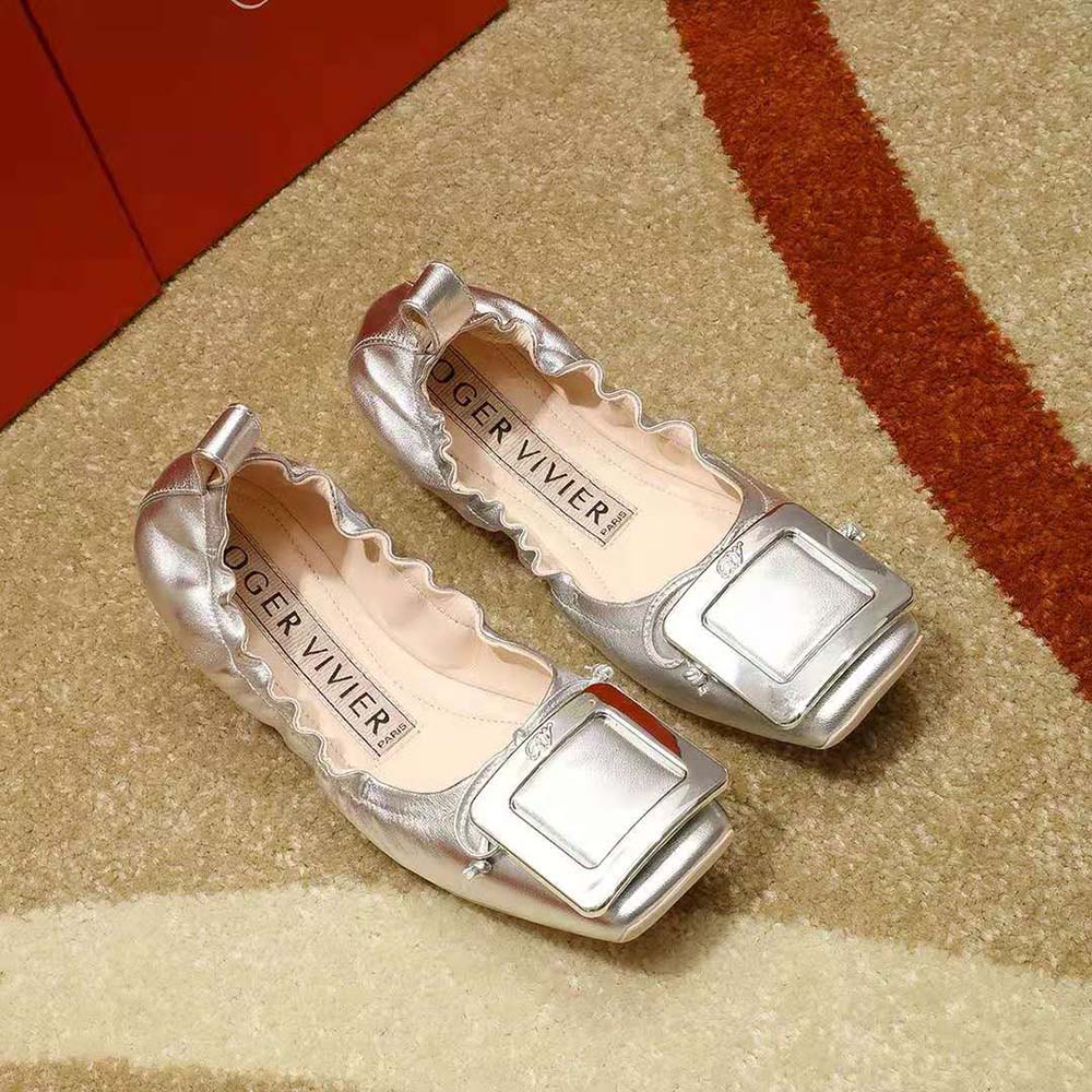 Top-down view showing nappa leather texture on Roger Vivier Viv’ Pockette ballerinas