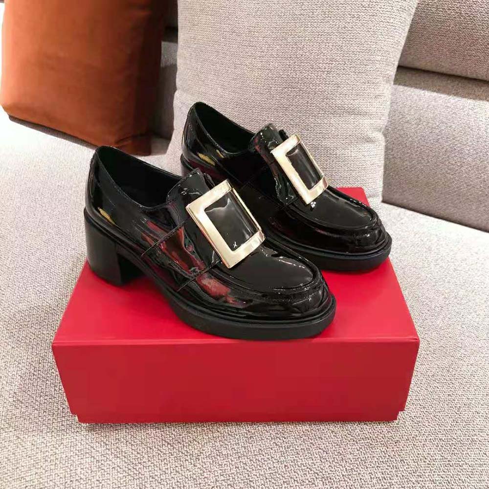 Close-up on silver metal buckle of Roger Vivier Viv’ Rangers loafers