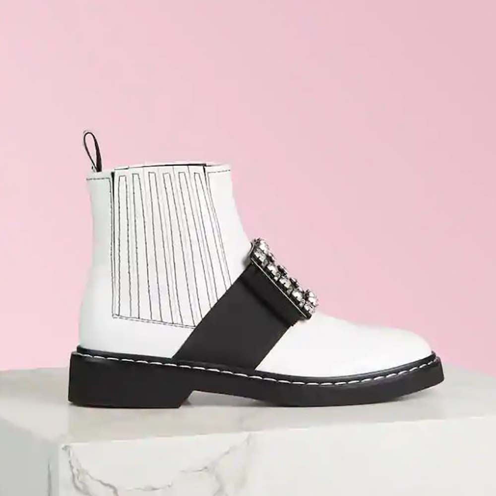 Side view of Roger Vivier Women Viv’ Rangers Stitch Strass Buckle Booties in Leather-White