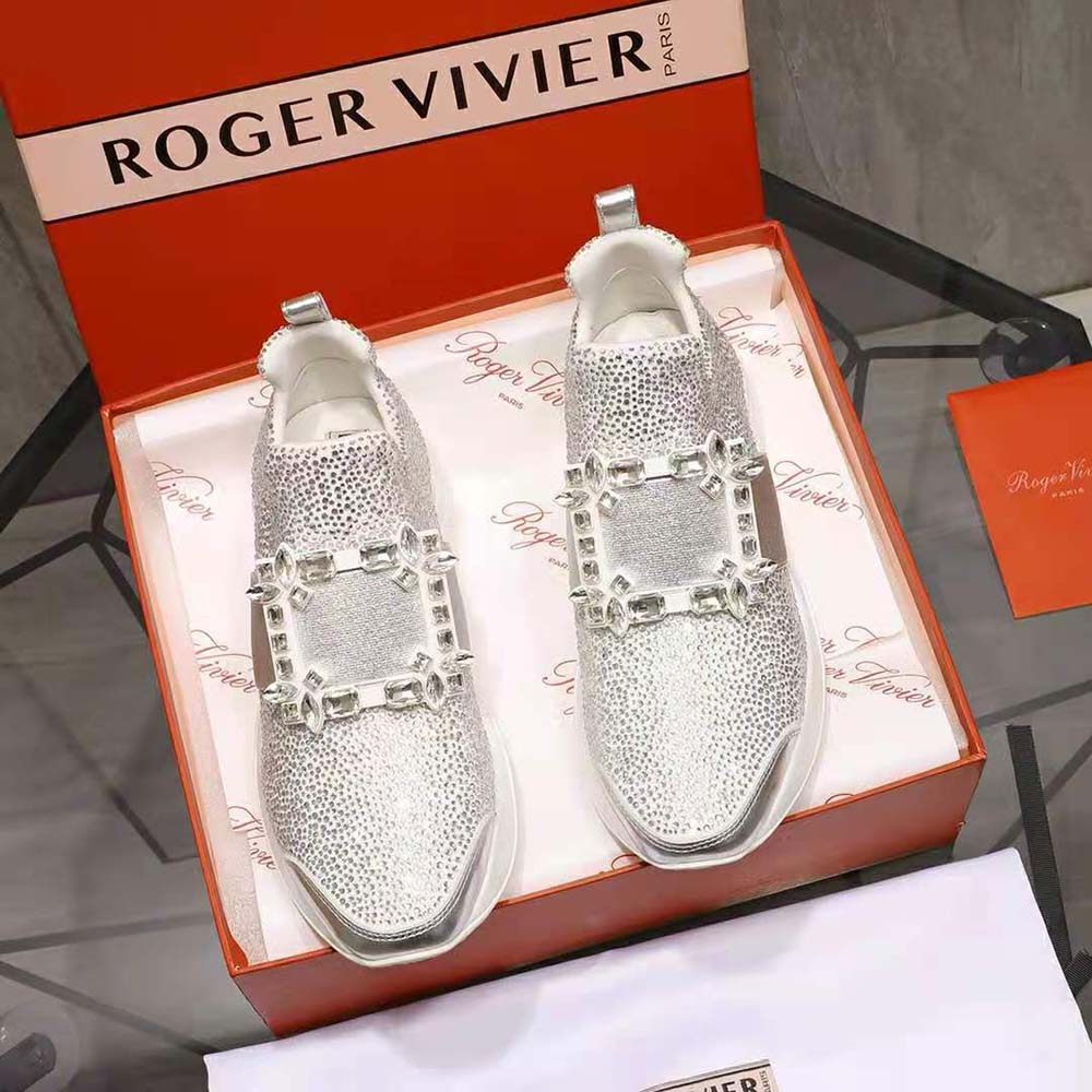 Close-up on crystal strass buckle of Roger Vivier Viv’ Run Sneakers