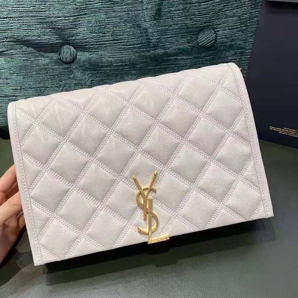 Close-up of quilted lambskin texture and gold YSL logo on Becky Mmini Chain Bag