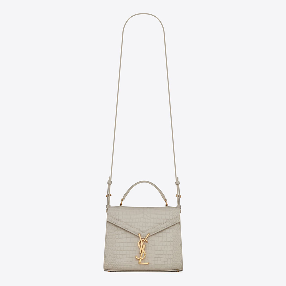 Front view of Saint Laurent YSL Women Cassandra Mini Top Handle Bag white leather