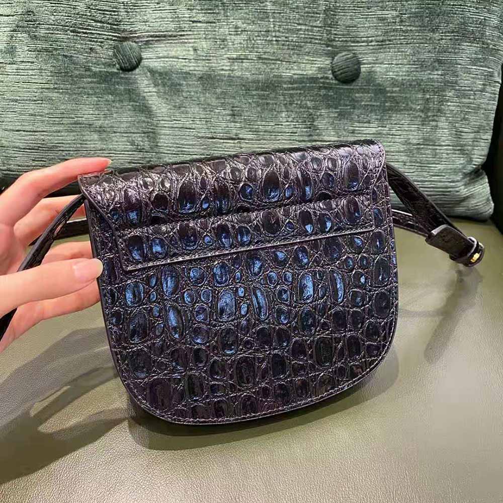 Side angle showing crocodile-embossed texture of Kaia Small Satchel