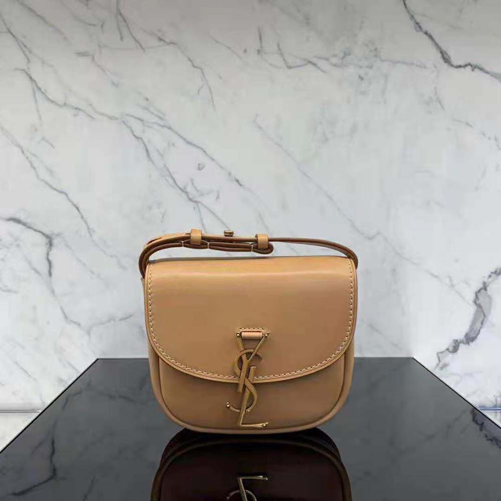 Close-up of YSL gold-tone hardware on Kaia Small Satchel in smooth vintage leather