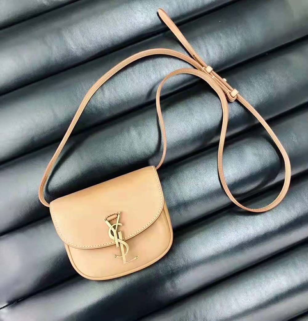 Side angle showing compact silhouette of Saint Laurent YSL Women Kaia Small Satchel