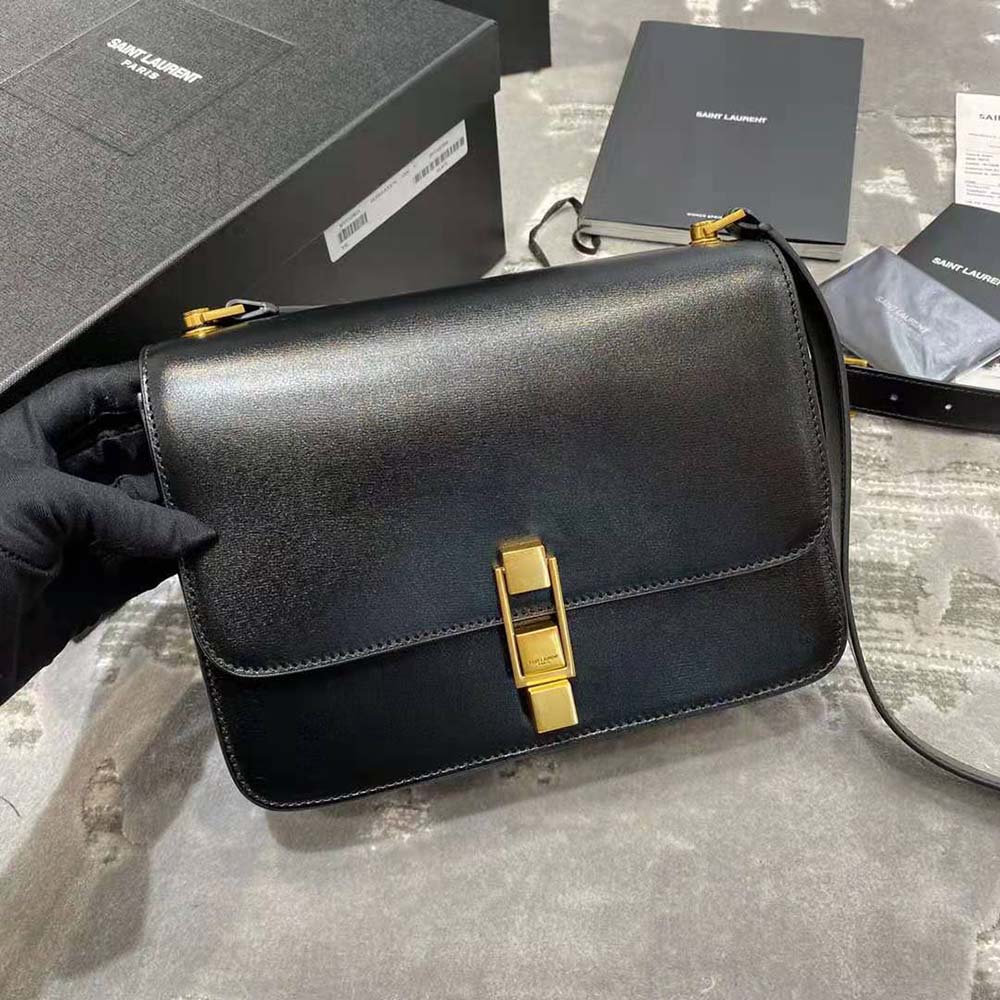 Close-up of gold YSL hardware on black Le Carre Satchel