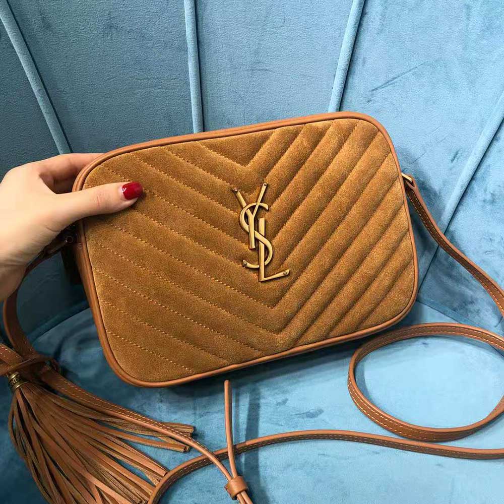 Side profile showing quilted texture on Saint Laurent YSL Lou Camera Bag