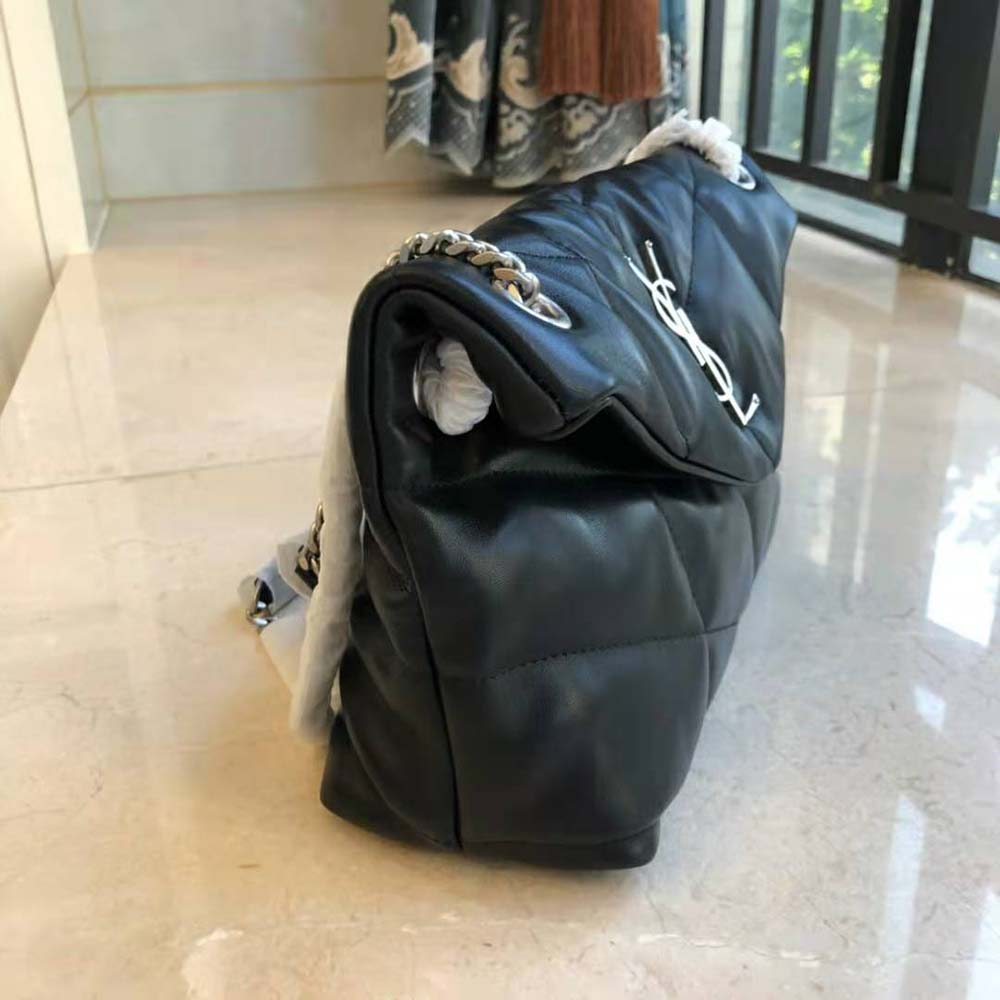 Side angle showing the magnetic closure on Saint Laurent YSL Loulou Puffer bag