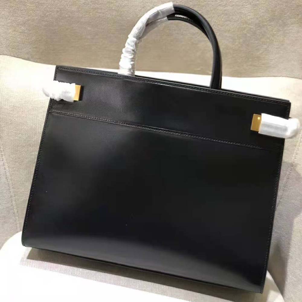 Side angle showing structured silhouette and top zipper of Saint Laurent YSL Women Manhattan Small Shopping
