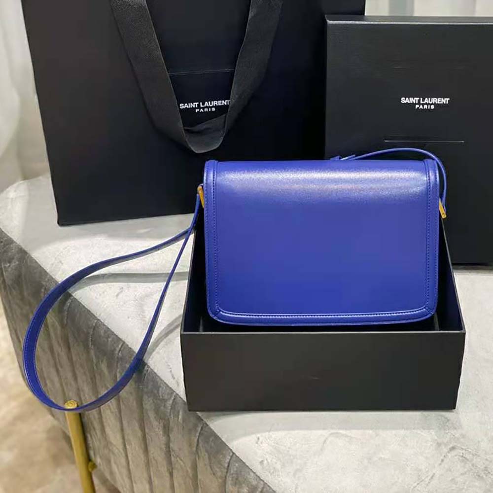 Side angle showing box leather texture of Saint Laurent Solferino medium satchel